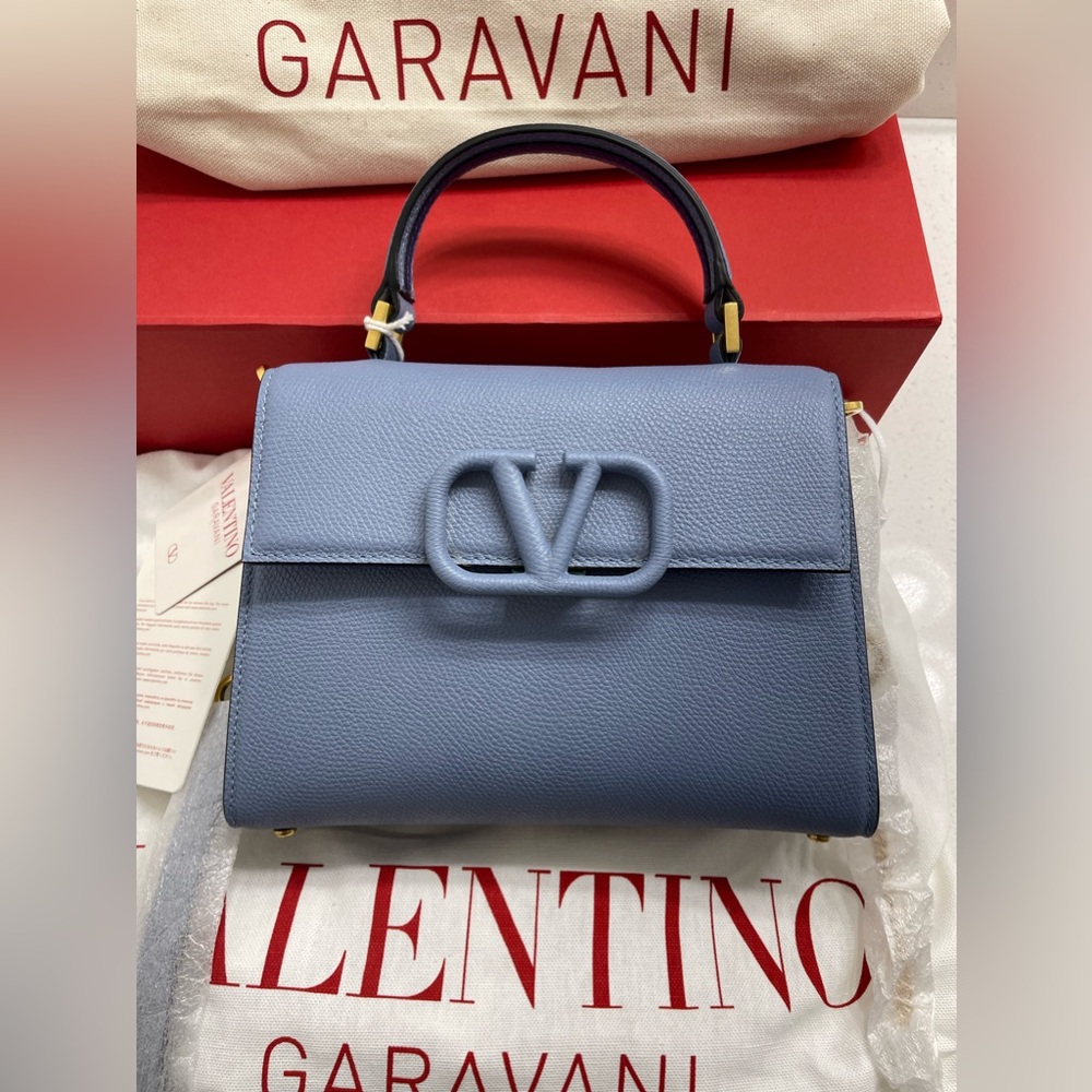 Valentino Garavani Small Vsling Grainy Calfskin Handbag in the color Niagara